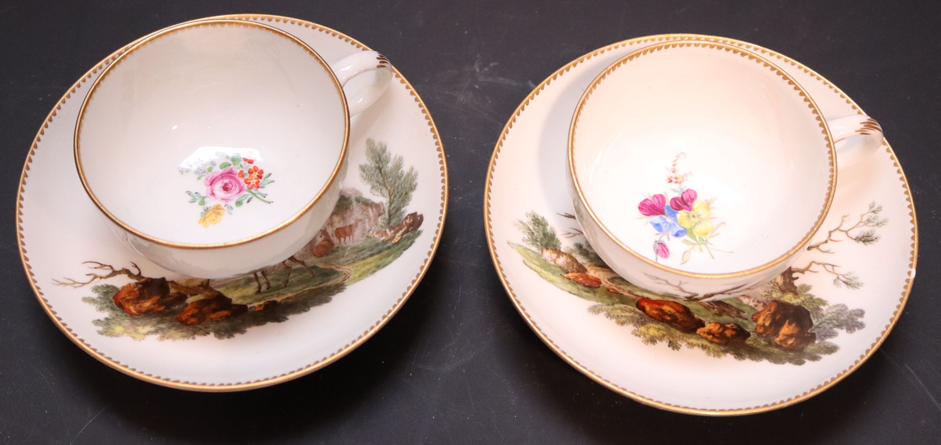 A pair of Meissen tea cups and saucers, saucers diameter 13cm